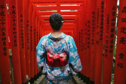 Woman, Japanese and temple or back for traditional culture for respect Tokyo travel, spirituality o