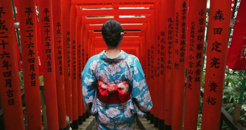 Woman, Japanese and temple or back for traditional culture for respect Tokyo travel, spirituality o